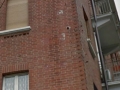 Anni 2000 - Particolare dell'edifico in Corso G. Cesare 77 che porta ancora le tracce dei fasci littori che erano infissi al muro